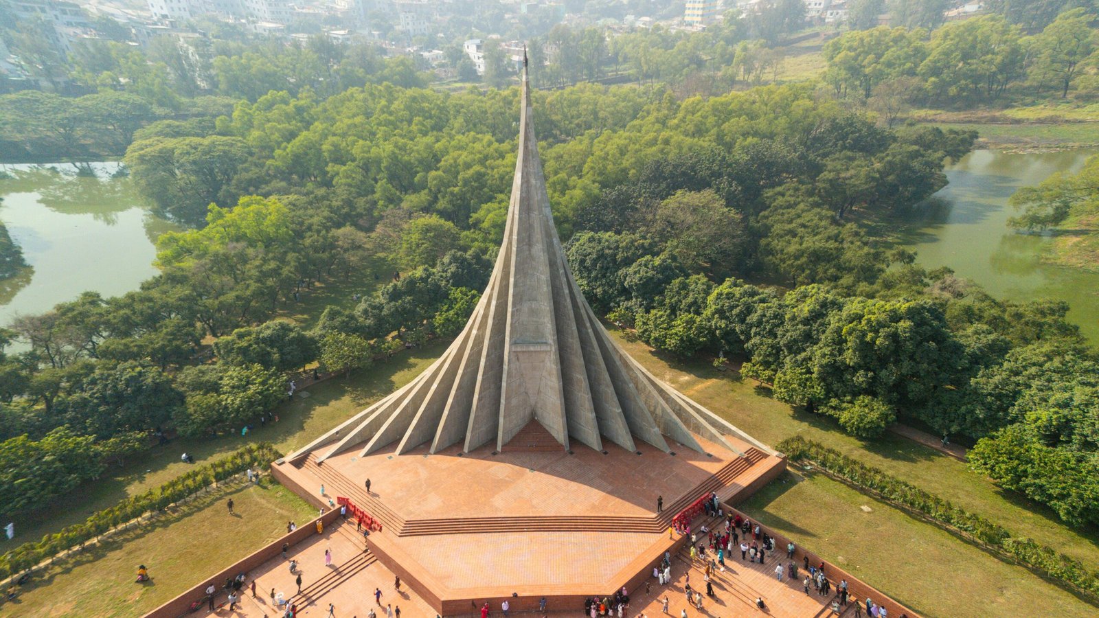 Breathtaking aerial view of the iconic Jatiyo Smriti Soudho in Savar, surrounded by lush landscapes.